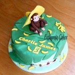 Bespoke Designer Celebration Cakes Curious George cake with bananas palm leaves