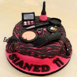 Bespoke Designer Celebration Cakes fuchsia pink Cake with purse cosmetic accesories