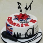 Bespoke Designer Celebration Cakes London and music themed cake notes microphone union jack