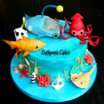 Cake toppers Bespoke Designer Celebration Cakes Under the sea cake with edible cake toppers lemon shark octonauts all butter cream