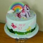 Bespoke Designer Celebration Cakes rainbow cake wtih pony, butterflies for 30th birthday