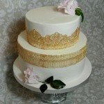 Bespoke Designer Celebration Cakes Birthday cake with golden lace gum paste hydrangea and foliage