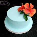 Luxury Wedding Cakes Eva Cockrell Cake Design Bespoke Designer Celebration Cakes Hawaiian themed birthday cake with sugar flowers hibiscus