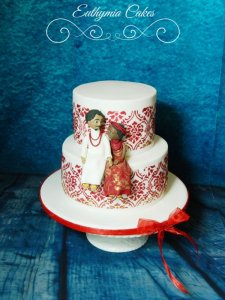 Chicheley Hall Supplier Wedding Showcase 22nd April 2018 Nigerian engagement cake in red wine and gold colours with edible figures topper wedding cakes Milton Keynes Northampton