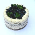 Semi naked birthday cake with blueberries and blackberries Euthymia Cakes Milton Keynes