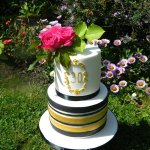 30th birthday celebration cake Euthymia Milton Keynes white gold black stripes