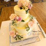 Luxury Wedding Cakes Eva Cockrell Cake Design butter cream wedding cake with fresh flowers County Cricket club Northampton