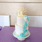 Luxury Wedding Cakes Eva Cockrell Cake Design White and Turquoise wedding cake Milton Keynes