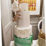 Luxury Wedding Cakes Eva Cockrell Cake Design White and Emerald green marble wedding cake with bronze accent
