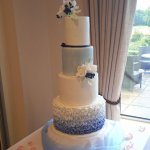 Luxury Wedding Cakes Eva Cockrell Cake Design Blue ombre navy wedding cake with sugar flowers
