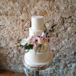 Luxury Wedding Cakes Eva Cockrell Cake Design Plain 4 tier ivory wedding cake decorated with fresh florals in Notley Abbey