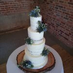 Luxury Wedding Cakes Eva Cockrell Cake Design Semi naked wedding cake with blue flowers and foliage