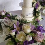 Luxury Wedding Cakes Eva Cockrell Cake Design Semi naked cake with purple and lilac fresh flowers
