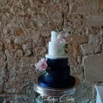 Luxury Wedding Cakes Eva Cockrell Cake Design Navy blue and white cake with initials and sugar flowers in Notley Abbey