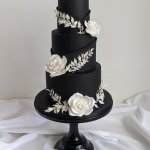 Luxury Wedding Cakes Eva Cockrell Cake Design Black and white wedding cake with sugar roses and dried ruscus by Eva Cockrell Cake Design
