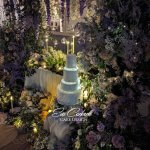 Midsummer night's dream wedding cake with floating tiers and fairy lights