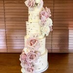 Textured butter cream cake with fresh roses