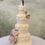 4 tier Lambeth style piping wedding cake for Indian wedding with fresh florals at the gorgeous Hedsor House